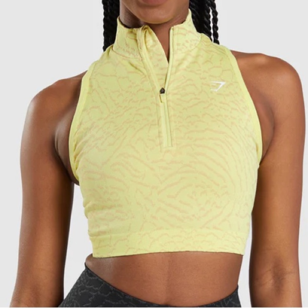 “ADAPT ANIMAL SEAMLESS CROP 1/2 ZIP”
